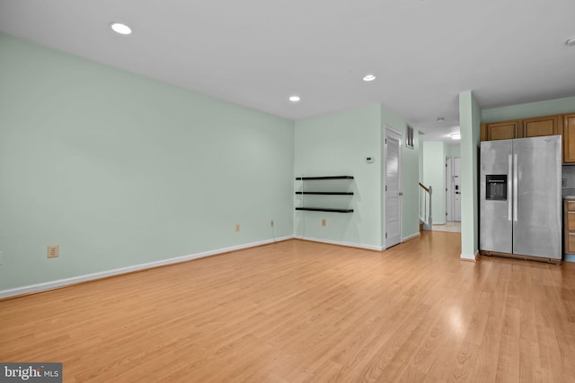 723 Dell Ct, Southampton, PA 18966 - unfurnished living room with light wood finished floors and recessed lighting