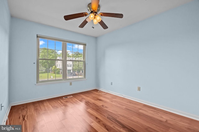 723 Dell Ct, Southampton, PA 18966 - empty room with wood finished floors and a ceiling fan