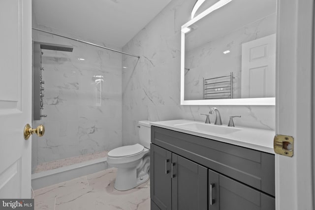 723 Dell Ct, Southampton, PA 18966 - bathroom featuring marble look tile flooring, vanity, a marble finish shower, tile walls, and a towel warming rack