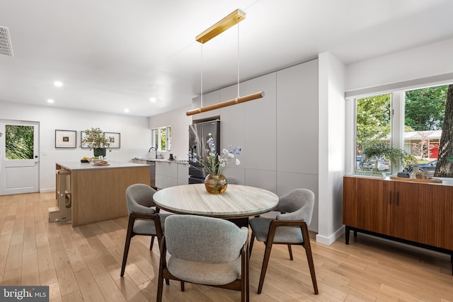 2103 Northcliff Dr, Baltimore, MD 21209 - dining space with light wood-style flooring and recessed lighting