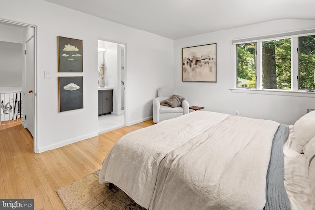 2103 Northcliff Dr, Baltimore, MD 21209 - bedroom with light wood-type flooring and ensuite bathroom