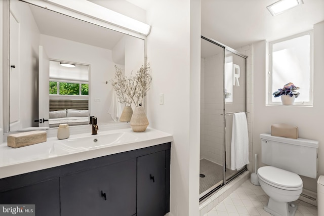 2103 Northcliff Dr, Baltimore, MD 21209 - ensuite bathroom featuring vanity, a shower stall, and tile patterned flooring