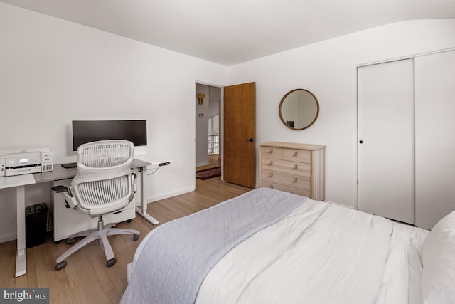2103 Northcliff Dr, Baltimore, MD 21209 - bedroom featuring wood finished floors, a closet, and a desk