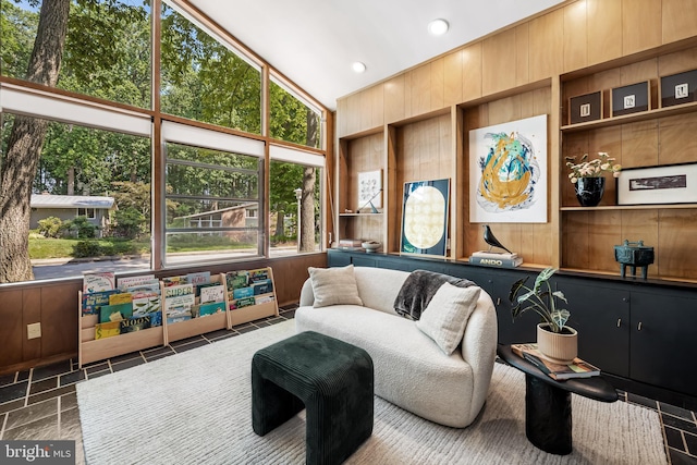 2103 Northcliff Dr, Baltimore, MD 21209 - living room featuring built in features, wooden walls, and recessed lighting