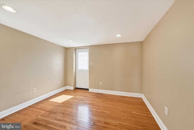 115 N Bradford St, Baltimore, MD 21224 - spare room with light wood-style flooring and recessed lighting