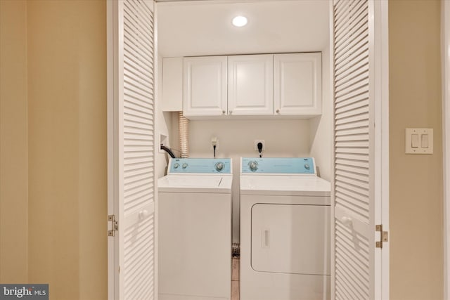 115 N Bradford St, Baltimore, MD 21224 - laundry room with washing machine and dryer and cabinet space