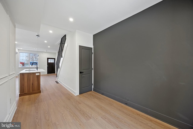 2504 E Cumberland St, Philadelphia, PA 19125 - empty room featuring light wood finished floors and recessed lighting