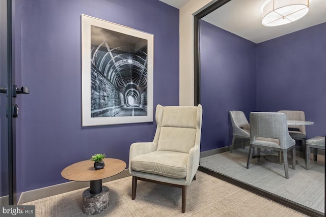 635 Slaters Ln Unit 109, Alexandria, VA 22314 - sitting room with baseboards