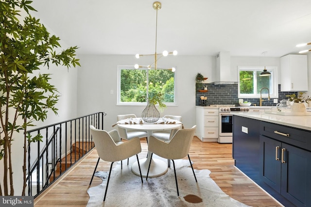 4501 Tipton Ln, Alexandria, VA 22310 - dining area featuring light wood-style floors