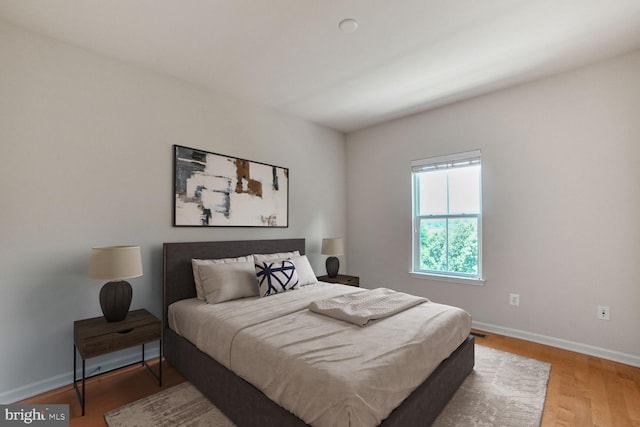 458 Exchange Ave Unit 458, Gaithersburg, MD 20878 - bedroom featuring baseboards and wood finished floors