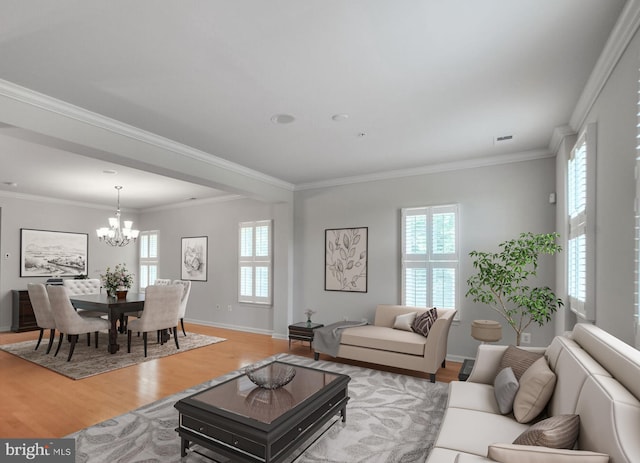 458 Exchange Ave Unit 458, Gaithersburg, MD 20878 - living area featuring light wood-style flooring, a chandelier, and crown molding