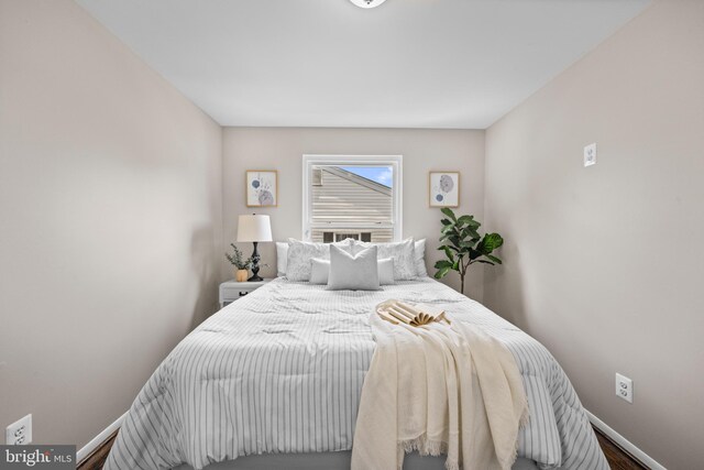 42 Brookshire Dr Unit A, Reisterstown, MD 21136 - bedroom featuring baseboards and wood finished floors