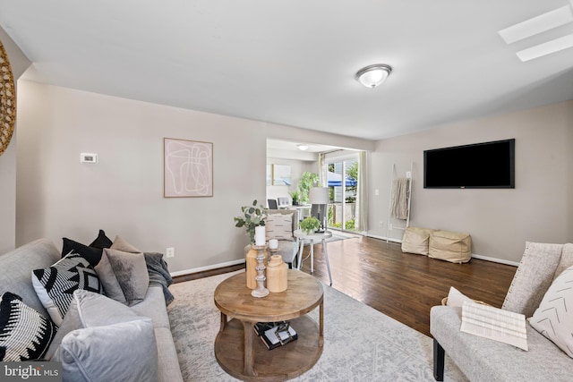 42 Brookshire Dr Unit A, Reisterstown, MD 21136 - living room with baseboards and wood finished floors
