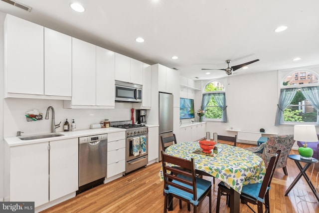 932 Locust St, Philadelphia, PA 19107 - kitchen with stainless steel appliances, recessed lighting, light wood finished floors, light countertops, and ceiling fan