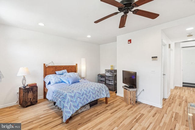932 Locust St, Philadelphia, PA 19107 - bedroom featuring light wood finished floors, an AC wall unit, recessed lighting, and a ceiling fan
