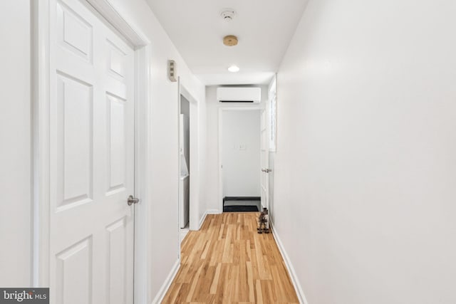 932 Locust St, Philadelphia, PA 19107 - hall featuring an AC wall unit and light wood-style floors