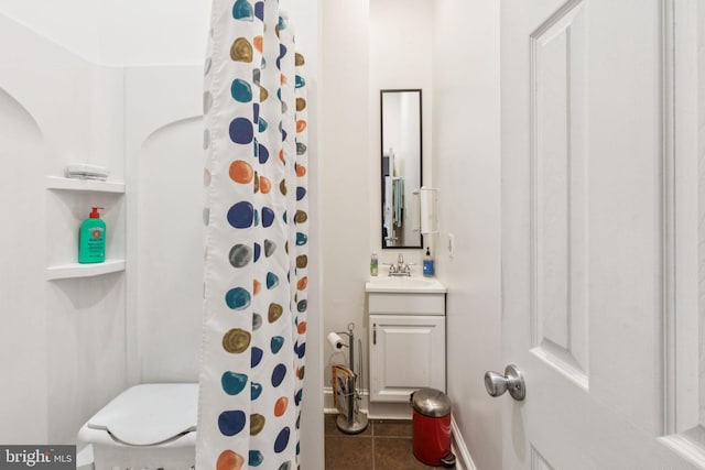 932 Locust St, Philadelphia, PA 19107 - bathroom with vanity, tile patterned floors, and a shower with shower curtain