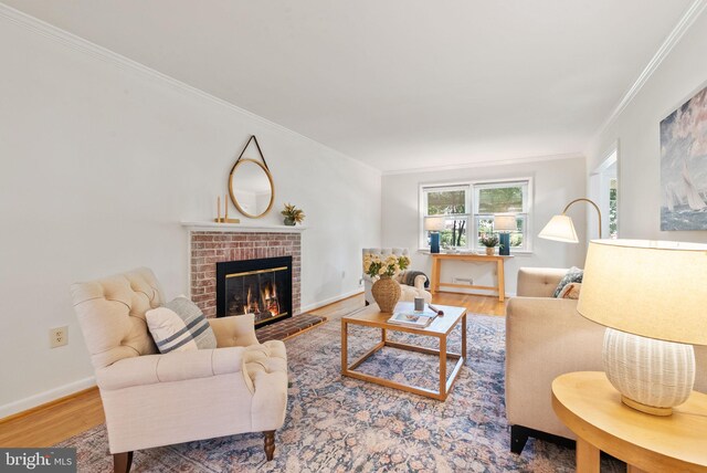 8700 Bluedale St, Alexandria, VA 22308 - living room featuring wood finished floors, a brick fireplace, and ornamental molding