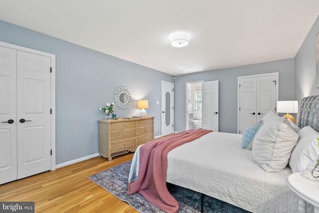 8700 Bluedale St, Alexandria, VA 22308 - bedroom featuring wood finished floors and connected bathroom