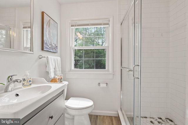 8700 Bluedale St, Alexandria, VA 22308 - full bath featuring a stall shower, vanity, and wood finished floors