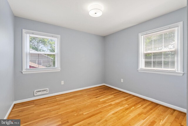8700 Bluedale St, Alexandria, VA 22308 - empty room featuring baseboards and light wood-style floors