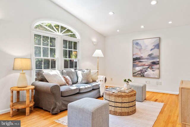 8700 Bluedale St, Alexandria, VA 22308 - living area with wood finished floors, recessed lighting, and vaulted ceiling
