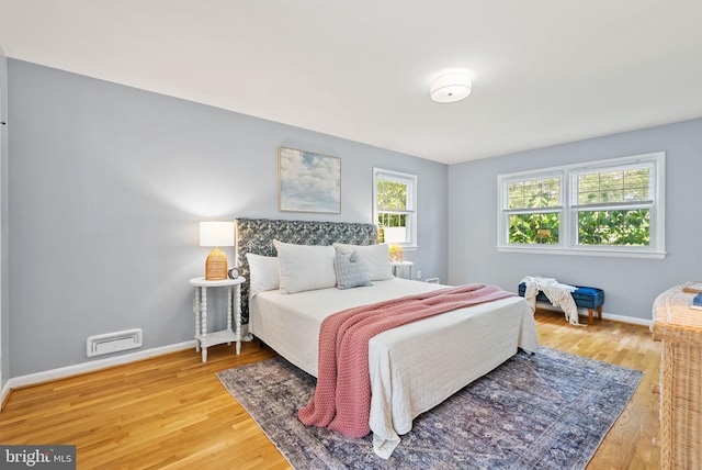 8700 Bluedale St, Alexandria, VA 22308 - bedroom with light wood-type flooring and baseboards