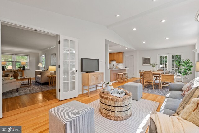 8700 Bluedale St, Alexandria, VA 22308 - living room featuring light wood-type flooring, recessed lighting, and french doors