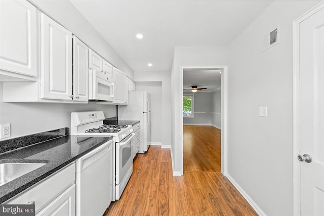 307 19th St NE, Washington, DC 20002 - kitchen with white appliances, ceiling fan, white cabinetry, light wood finished floors, and recessed lighting