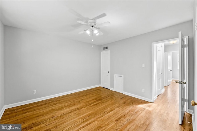 307 19th St NE, Washington, DC 20002 - empty room with light wood-style floors and a ceiling fan