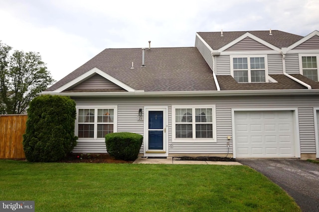 26 Courtyard Dr, Carlisle, PA 17013 - view of front facade featuring driveway, roof with shingles, and a garage