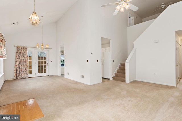 26 Courtyard Dr, Carlisle, PA 17013 - unfurnished living room featuring high vaulted ceiling, carpet floors, stairway, a chandelier, and a ceiling fan