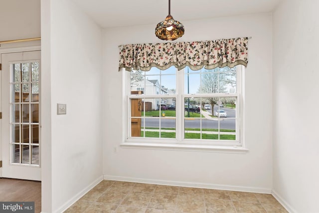 26 Courtyard Dr, Carlisle, PA 17013 - unfurnished dining area featuring baseboards