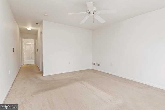 26 Courtyard Dr, Carlisle, PA 17013 - empty room with light colored carpet, a ceiling fan, and a smoke detector