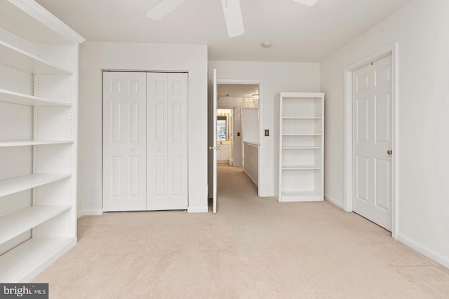 26 Courtyard Dr, Carlisle, PA 17013 - unfurnished bedroom featuring light colored carpet, a closet, and a ceiling fan