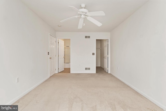 26 Courtyard Dr, Carlisle, PA 17013 - unfurnished bedroom with a spacious closet, light carpet, a closet, and a ceiling fan