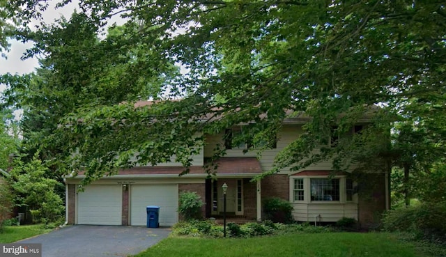 8318 Oakford Dr, Springfield, VA 22152 - view of property hidden behind natural elements with driveway