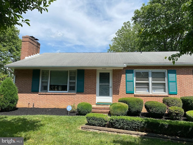 13343 Keener Rd, Hagerstown, MD 21742 - single story home featuring brick siding, a chimney, roof with shingles, and a front yard