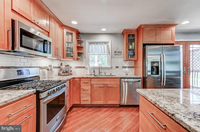 108 Strathdon Way, Lutherville Timonium, MD 21093 - kitchen featuring stainless steel appliances, backsplash, light stone countertops, glass insert cabinets, and recessed lighting