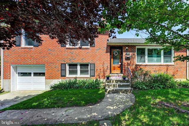108 Strathdon Way, Lutherville Timonium, MD 21093 - split level home featuring a garage, brick siding, driveway, and a front yard