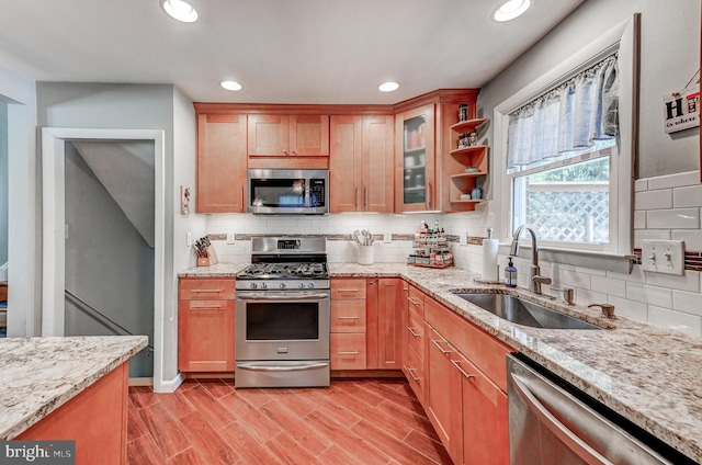 108 Strathdon Way, Lutherville Timonium, MD 21093 - kitchen with appliances with stainless steel finishes, light stone countertops, decorative backsplash, recessed lighting, and glass insert cabinets