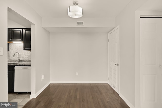 6930 Hanover Pkwy Unit 302, Greenbelt, MD 20770 - unfurnished dining area featuring a sink and dark wood finished floors