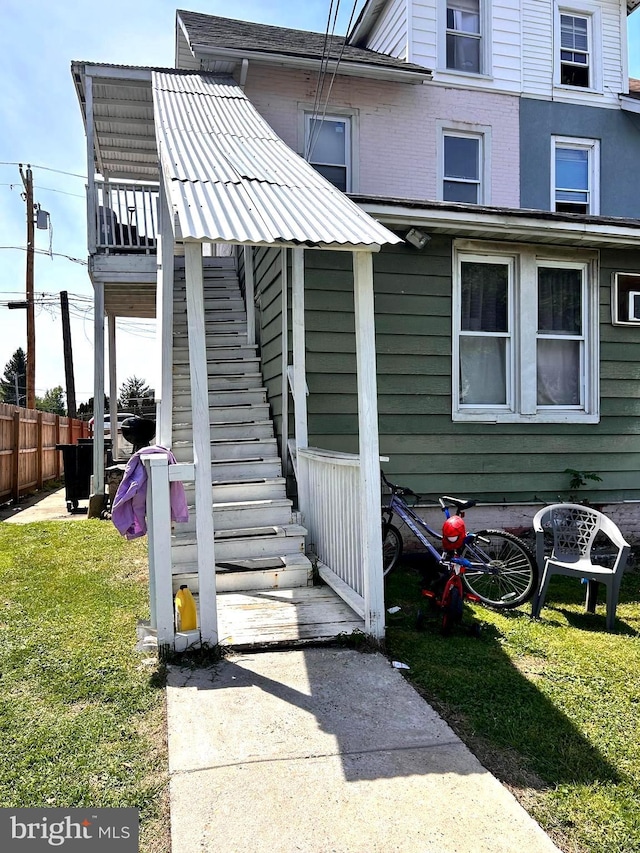 407 Church Ln, Yeadon, PA 19050 - view of home's exterior featuring stairway and brick siding