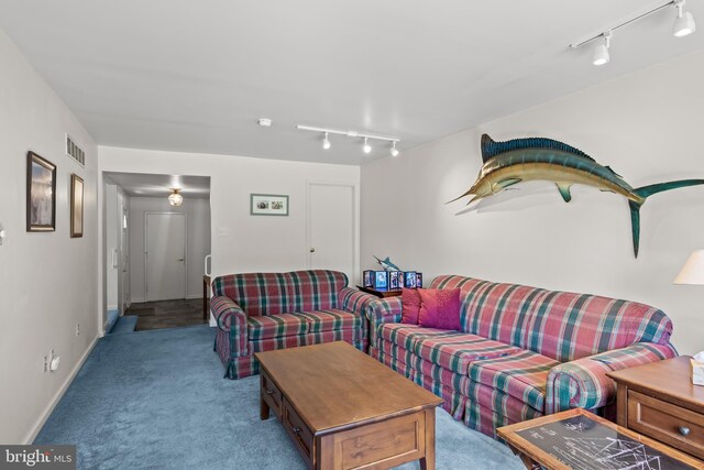 325 Tenby Chase Dr, Delran, NJ 08075 - carpeted living room featuring rail lighting and baseboards