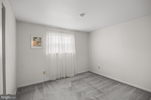 325 Tenby Chase Dr, Delran, NJ 08075 - carpeted spare room with baseboards and a smoke detector