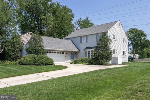 325 Tenby Chase Dr, Delran, NJ 08075 - view of front facade with a garage, a front lawn, concrete driveway, and a shingled roof