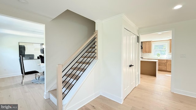 904 Man O War Ln, Great Falls, VA 22066 - stairs with wood finished floors, crown molding, and recessed lighting