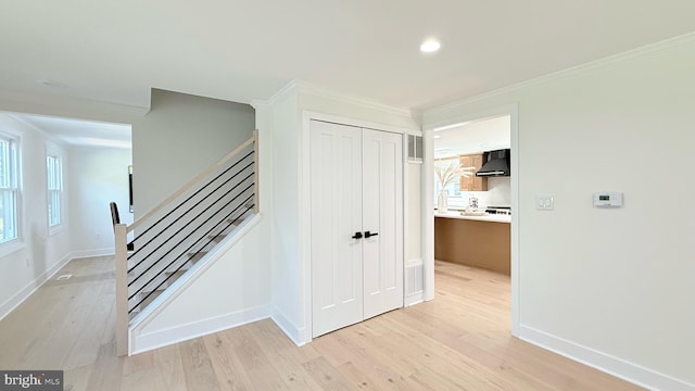 904 Man O War Ln, Great Falls, VA 22066 - stairs featuring ornamental molding, wood finished floors, and recessed lighting