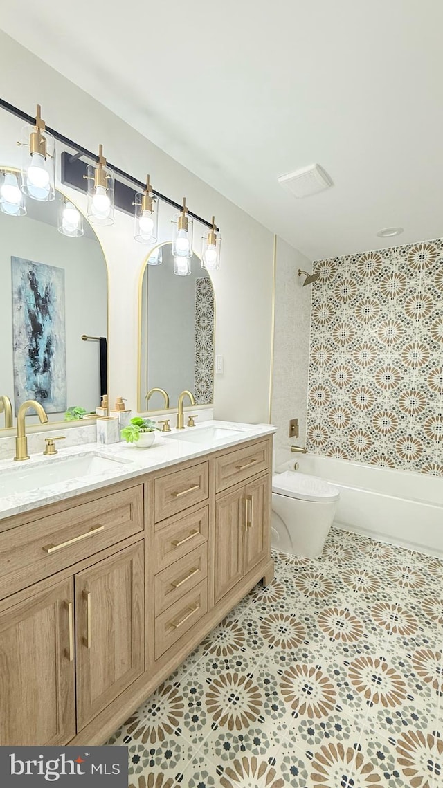 904 Man O War Ln, Great Falls, VA 22066 - full bathroom featuring double vanity, tile patterned floors, and tub / shower combination