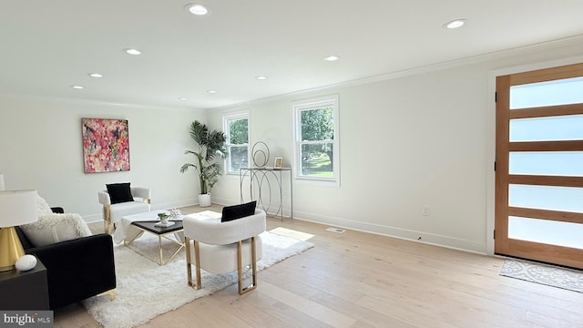 904 Man O War Ln, Great Falls, VA 22066 - living area with crown molding, recessed lighting, and light wood-type flooring